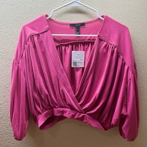 pink cropped long sleeve v neck top